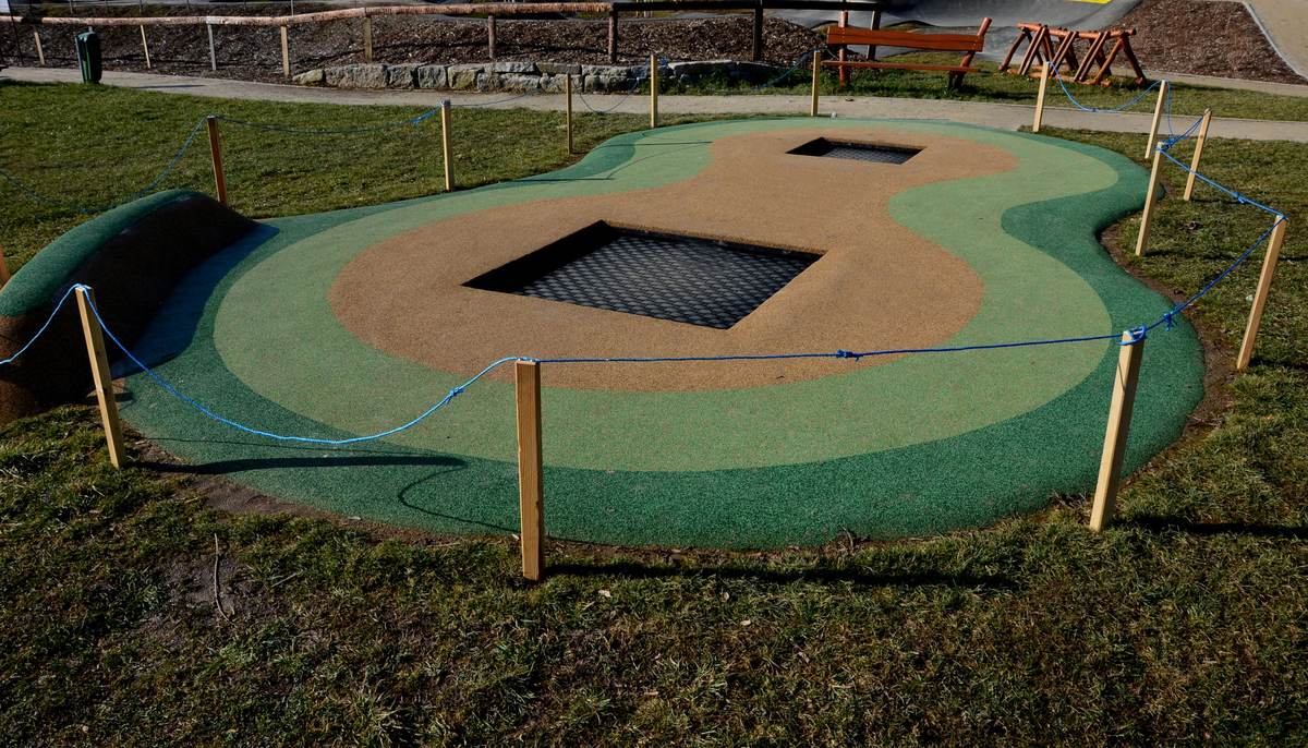 Coloured wetpour safety surfacing